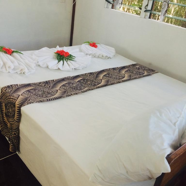 Отель Vacations Beach Fale Manase Экстерьер фото